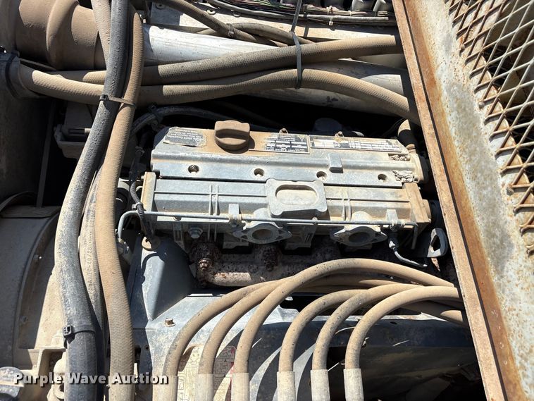 image for item EM0562 1999 Power Curber 5700B curb machine