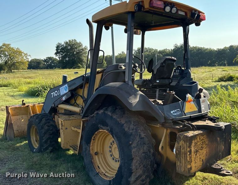 image for item EM0575 2009 John Deere 710J landscape tractor
