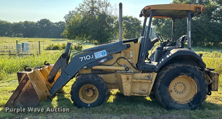 image for item EM0575 2009 John Deere 710J landscape tractor