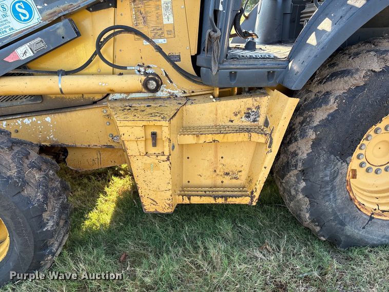 image for item EM0575 2009 John Deere 710J landscape tractor