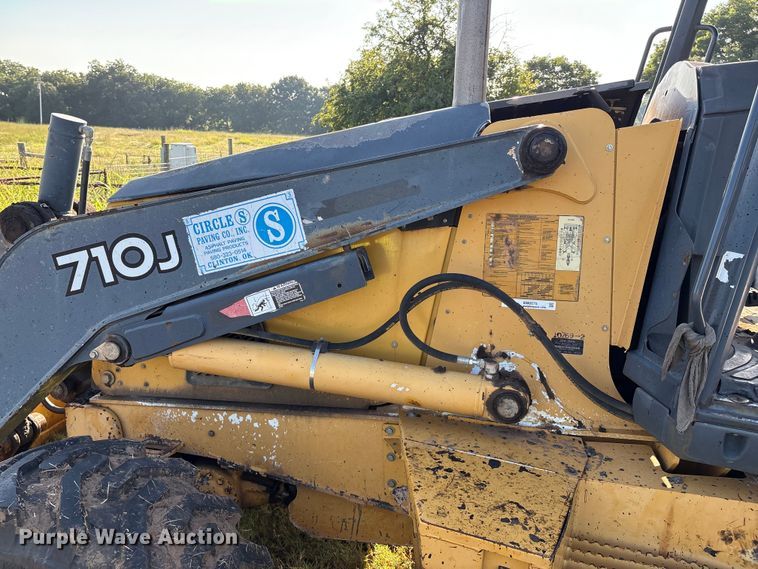 image for item EM0575 2009 John Deere 710J landscape tractor