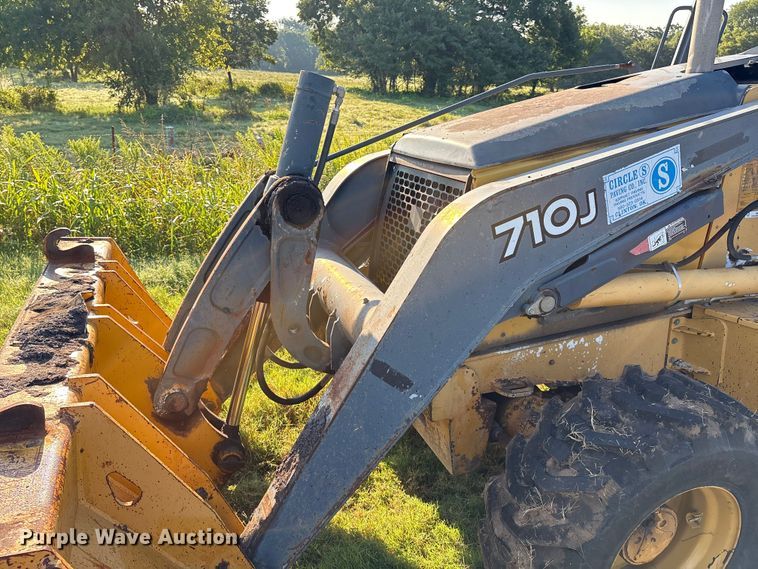 image for item EM0575 2009 John Deere 710J landscape tractor