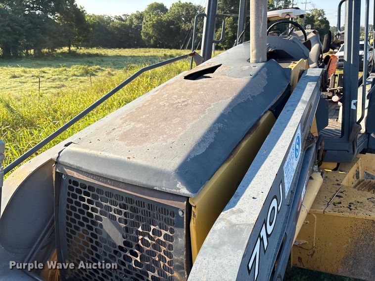 image for item EM0575 2009 John Deere 710J landscape tractor