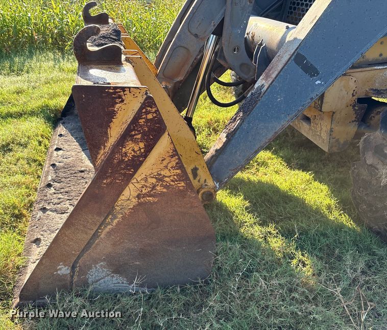 image for item EM0575 2009 John Deere 710J landscape tractor