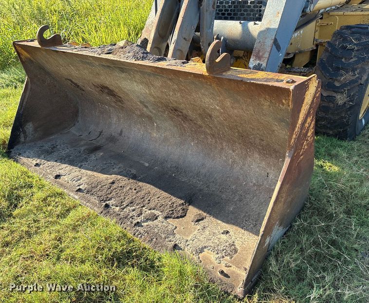 image for item EM0575 2009 John Deere 710J landscape tractor