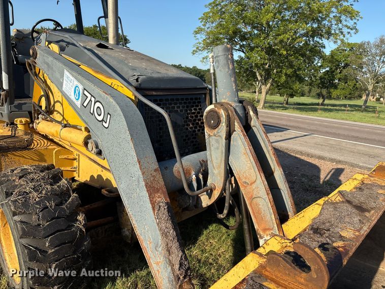 image for item EM0575 2009 John Deere 710J landscape tractor