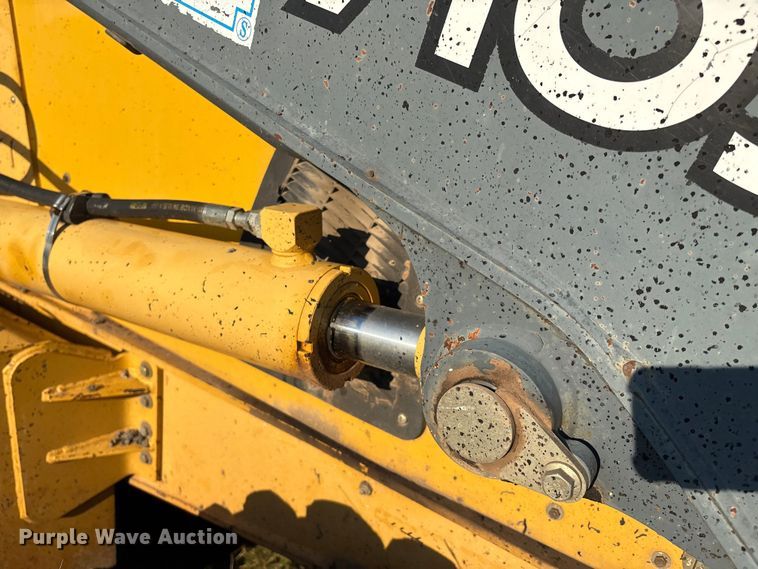 image for item EM0575 2009 John Deere 710J landscape tractor