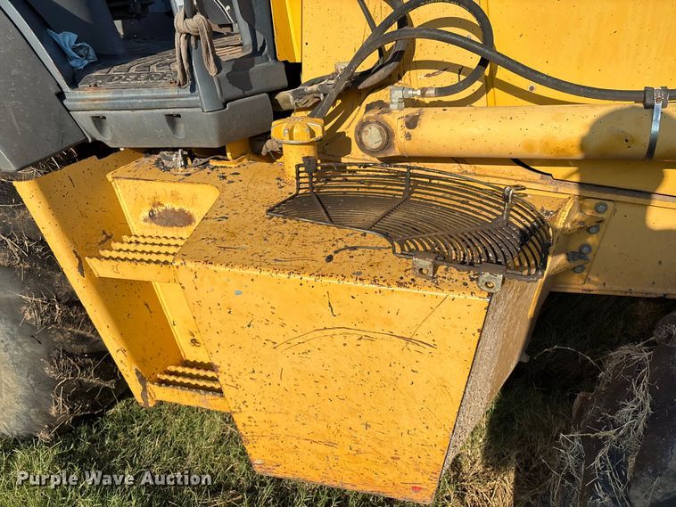 image for item EM0575 2009 John Deere 710J landscape tractor