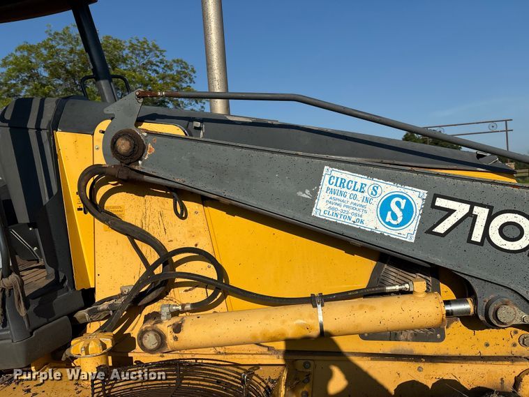 image for item EM0575 2009 John Deere 710J landscape tractor