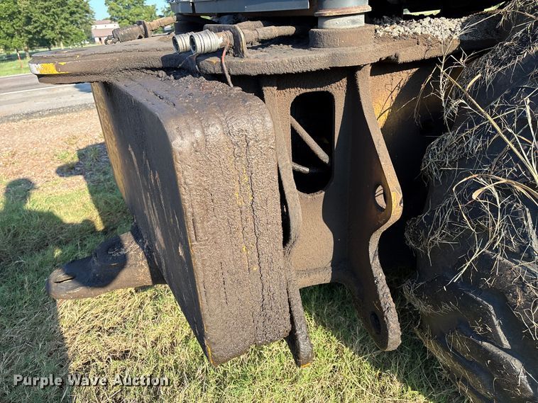 image for item EM0575 2009 John Deere 710J landscape tractor