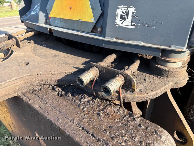 image for item EM0575 2009 John Deere 710J landscape tractor