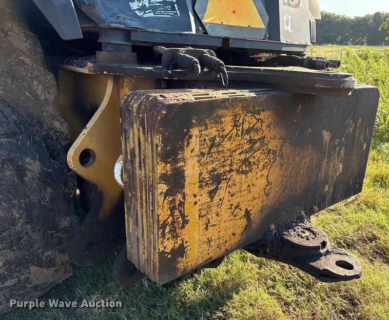 image for item EM0575 2009 John Deere 710J landscape tractor