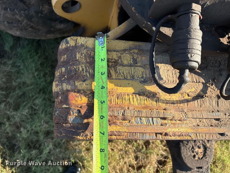 image for item EM0575 2009 John Deere 710J landscape tractor