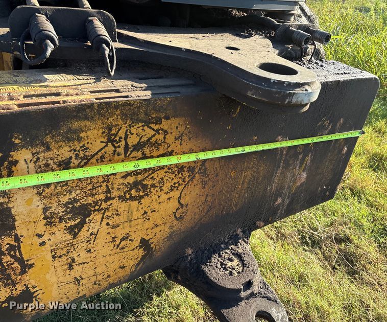 image for item EM0575 2009 John Deere 710J landscape tractor