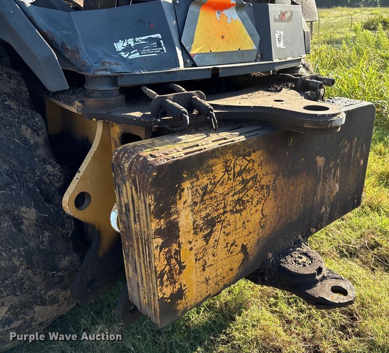 image for item EM0575 2009 John Deere 710J landscape tractor