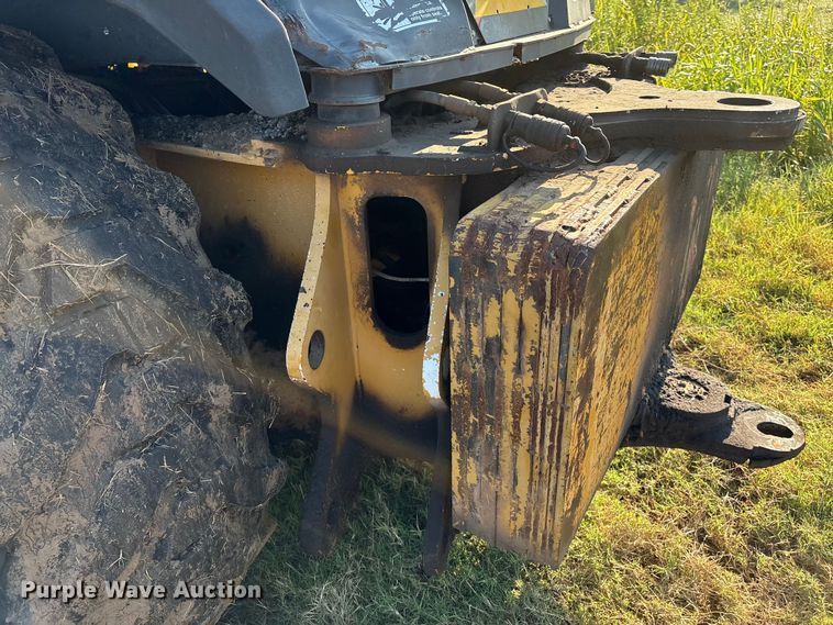 image for item EM0575 2009 John Deere 710J landscape tractor