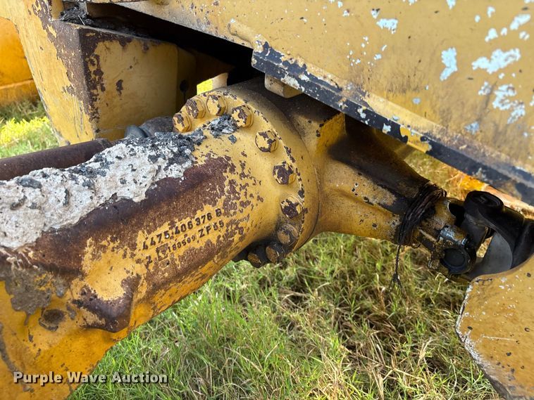 image for item EM0575 2009 John Deere 710J landscape tractor