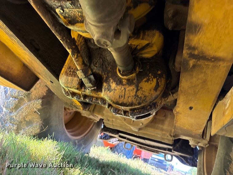 image for item EM0575 2009 John Deere 710J landscape tractor