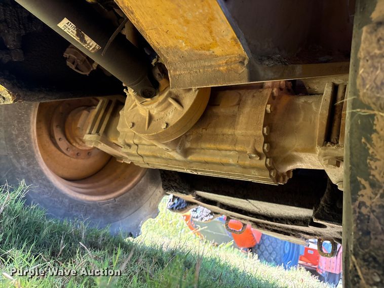 image for item EM0575 2009 John Deere 710J landscape tractor