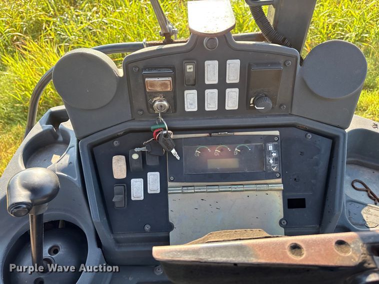 image for item EM0575 2009 John Deere 710J landscape tractor