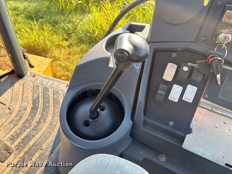 image for item EM0575 2009 John Deere 710J landscape tractor