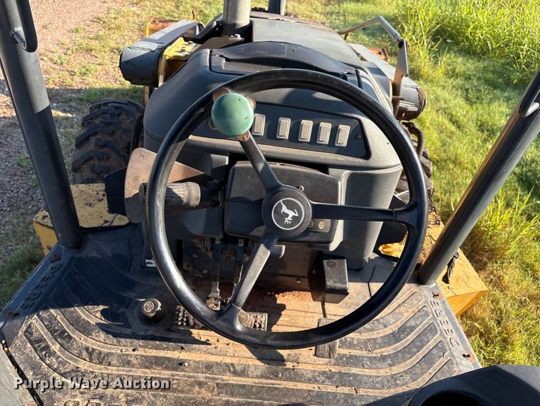 image for item EM0575 2009 John Deere 710J landscape tractor