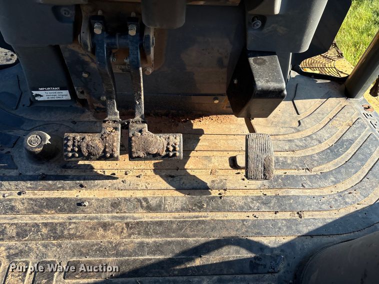 image for item EM0575 2009 John Deere 710J landscape tractor