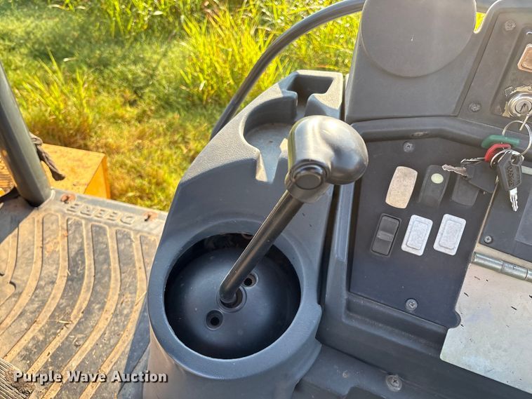 image for item EM0575 2009 John Deere 710J landscape tractor