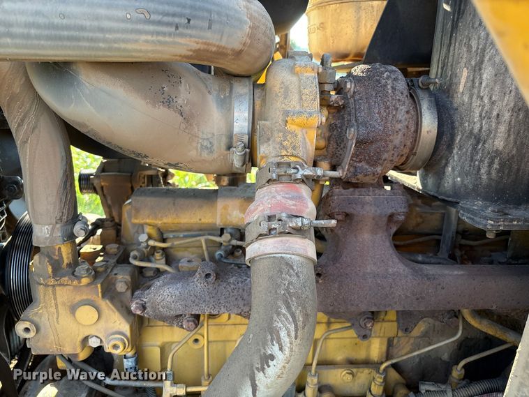 image for item EM0575 2009 John Deere 710J landscape tractor