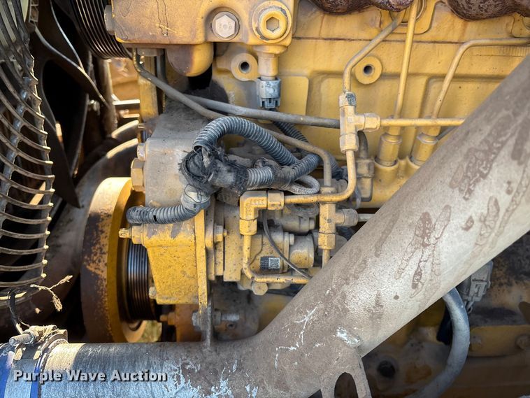 image for item EM0575 2009 John Deere 710J landscape tractor