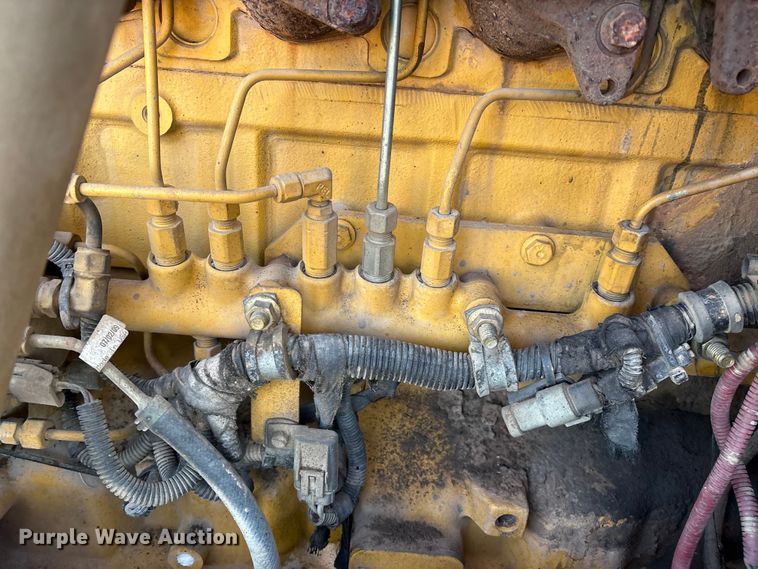 image for item EM0575 2009 John Deere 710J landscape tractor