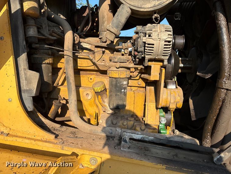 image for item EM0575 2009 John Deere 710J landscape tractor