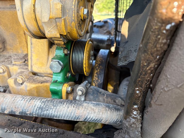 image for item EM0575 2009 John Deere 710J landscape tractor