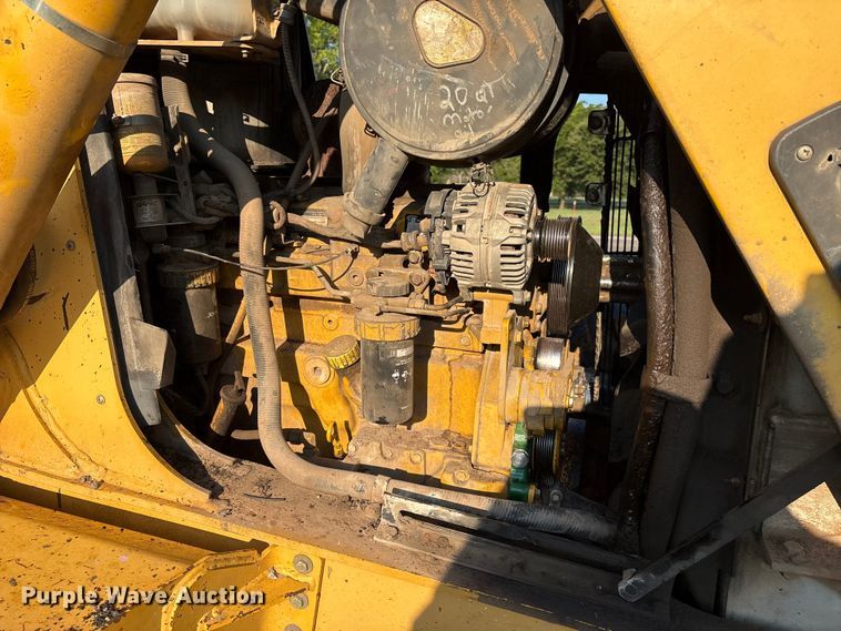 image for item EM0575 2009 John Deere 710J landscape tractor