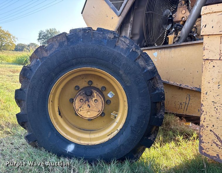 image for item EM0575 2009 John Deere 710J landscape tractor