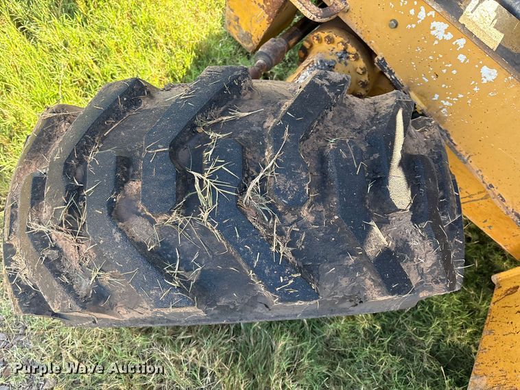 image for item EM0575 2009 John Deere 710J landscape tractor