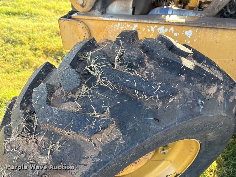 image for item EM0575 2009 John Deere 710J landscape tractor