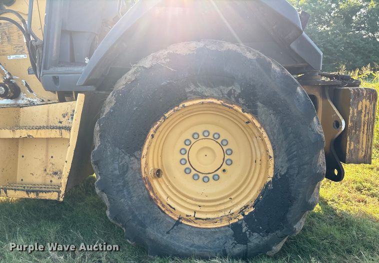 image for item EM0575 2009 John Deere 710J landscape tractor