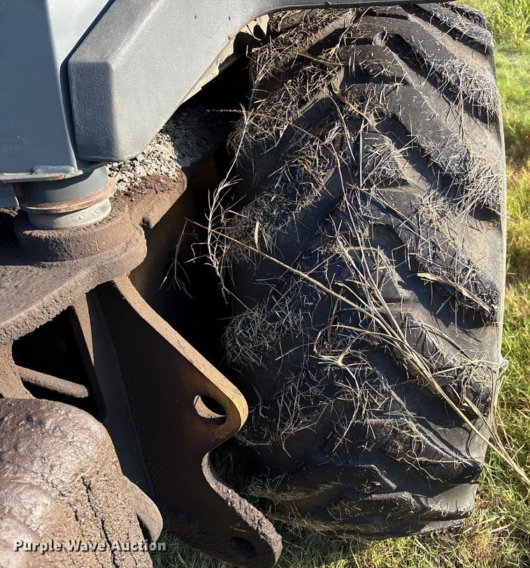 image for item EM0575 2009 John Deere 710J landscape tractor