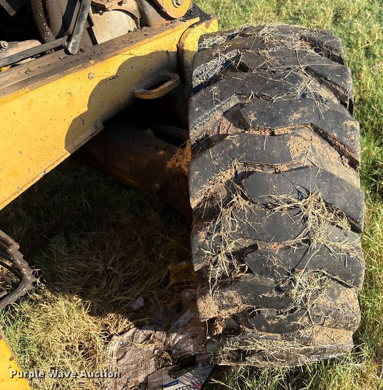 image for item EM0575 2009 John Deere 710J landscape tractor