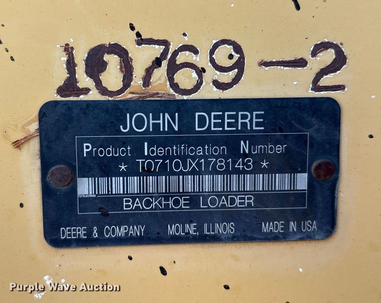 image for item EM0575 2009 John Deere 710J landscape tractor