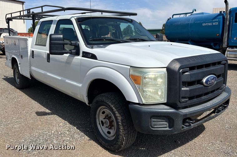 image for item EM5062 2011 Ford F250 Super Duty XL Crew Cab utility bed pickup truck