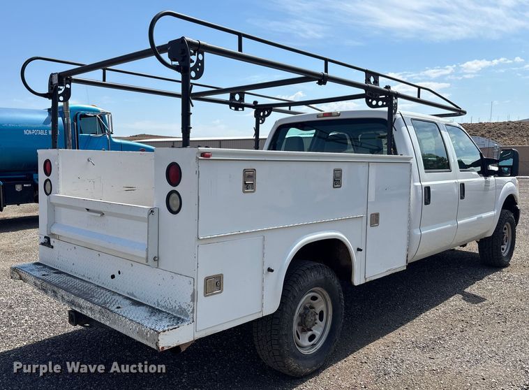 image for item EM5062 2011 Ford F250 Super Duty XL Crew Cab utility bed pickup truck