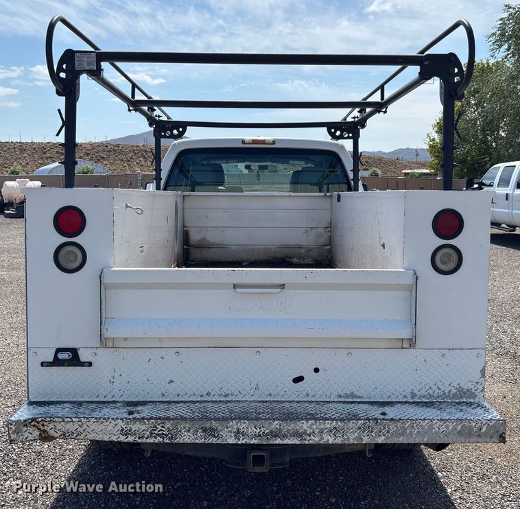 image for item EM5062 2011 Ford F250 Super Duty XL Crew Cab utility bed pickup truck