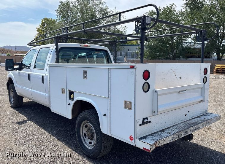 image for item EM5062 2011 Ford F250 Super Duty XL Crew Cab utility bed pickup truck