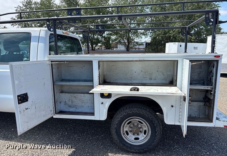 image for item EM5062 2011 Ford F250 Super Duty XL Crew Cab utility bed pickup truck