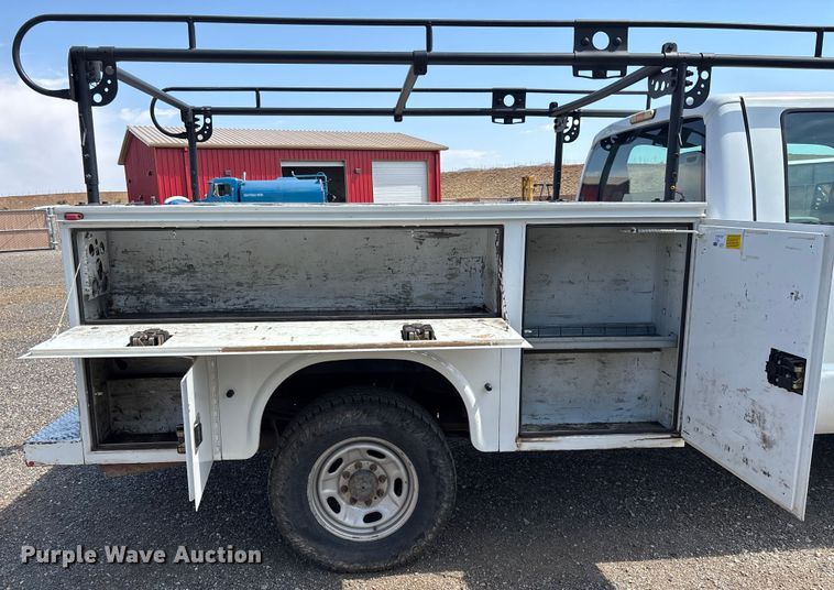 image for item EM5062 2011 Ford F250 Super Duty XL Crew Cab utility bed pickup truck