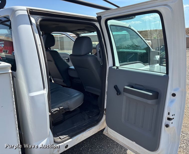 image for item EM5062 2011 Ford F250 Super Duty XL Crew Cab utility bed pickup truck