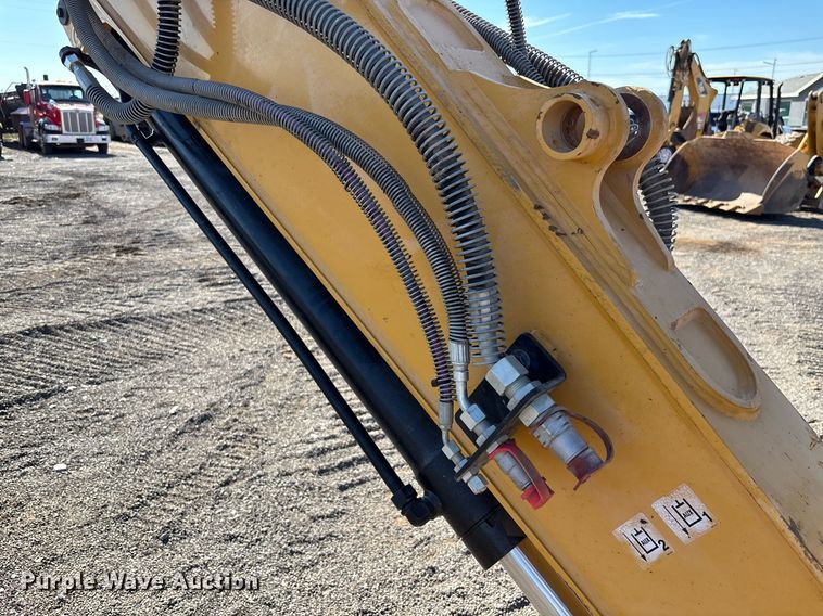 image for item EM5079 2020 Caterpillar 310 excavator