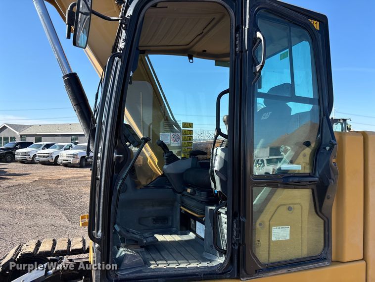 image for item EM5079 2020 Caterpillar 310 excavator